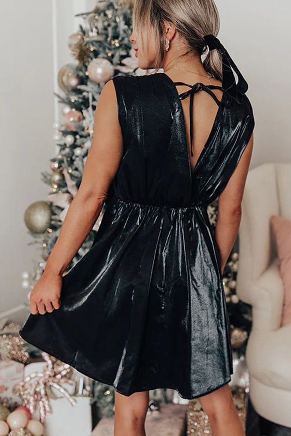 Vestido mini con bolsillos y diseño de lazo de satén con una vista fascinante