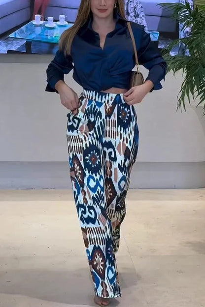 Pantalones anchos con bolsillo y cintura elástica en la espalda con estampado único de Emelia