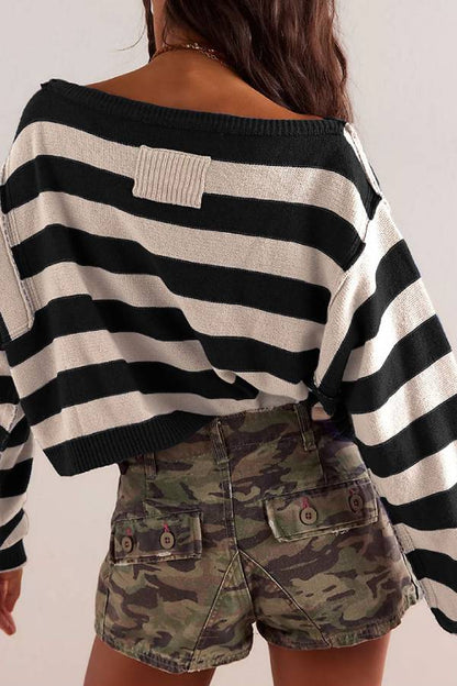 Suéter de punto holgado de manga larga con cuello redondo y estampado de rayas
