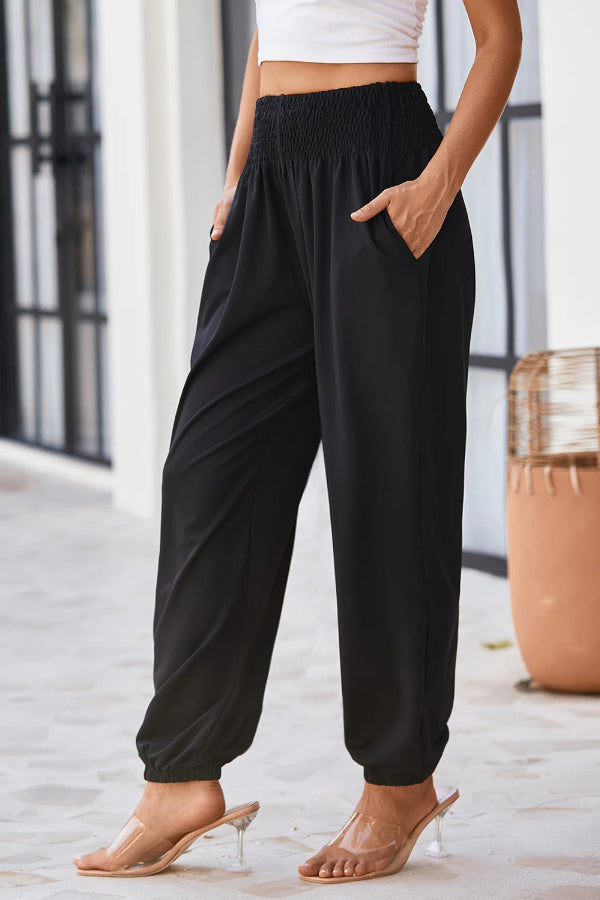 Joggers negros de cintura alta con bolsillos y fruncido