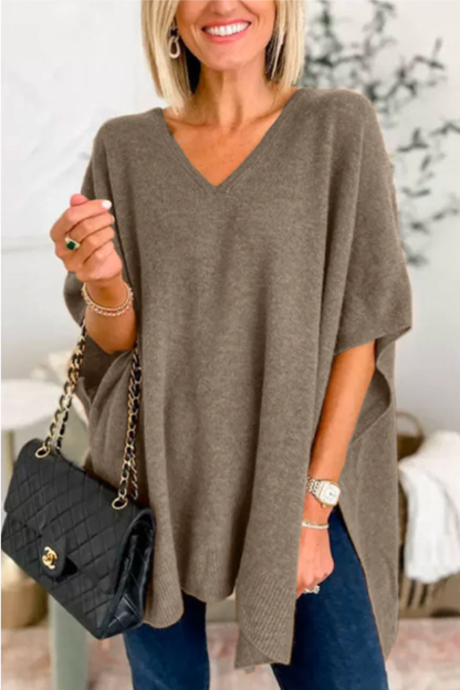Suéter tipo poncho holgado de color liso con cuello en V