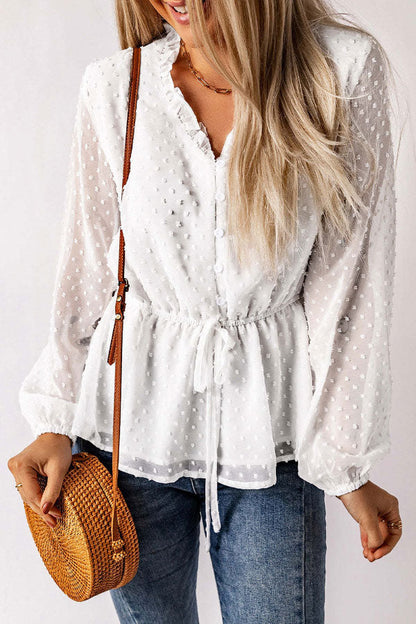 Elegante blusa de lunares con cuello en V, botones y cintura anudada