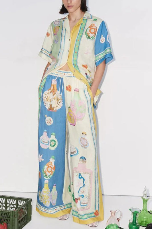 Pantalones anchos con cintura elástica y bolsillo en mezcla de lino con estampado único de Creating Memories
