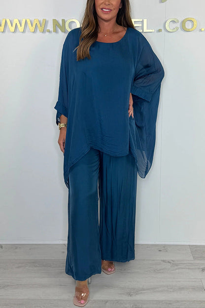 Conjunto de top holgado con cuello redondo y mangas murciélago de color liso y pantalones anchos con cintura elástica