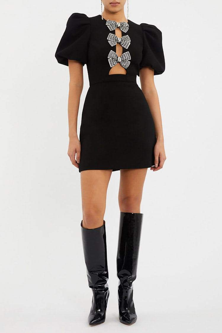 Minivestido con mangas abullonadas y aberturas 