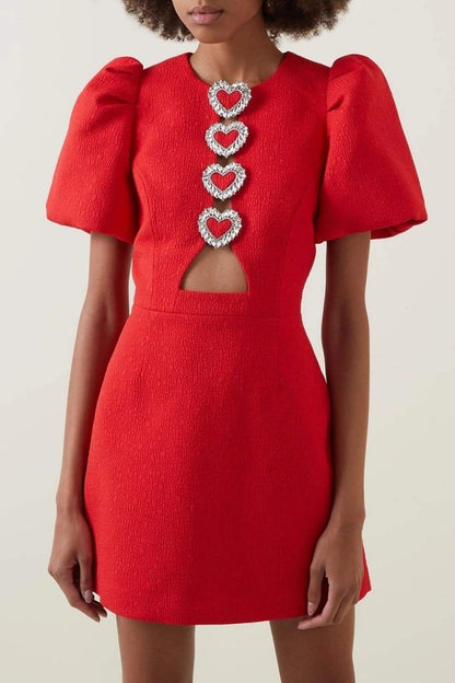 Minivestido con mangas abullonadas y aberturas 