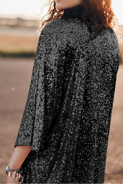 Cárdigan largo con lentejuelas color albaricoque, mangas 3/4 y abertura frontal