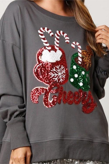 Sudadera informal holgada con lentejuelas y taza de dulces navideños