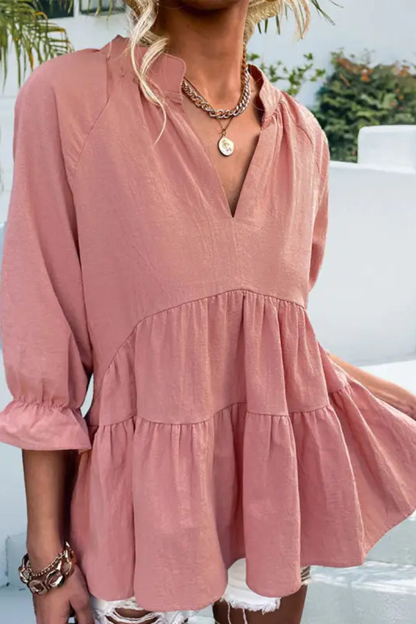Blusa informal holgada de color liso con cuello en V y manga larga