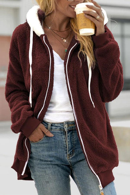 Chaqueta con capucha y cremallera de felpa suelta