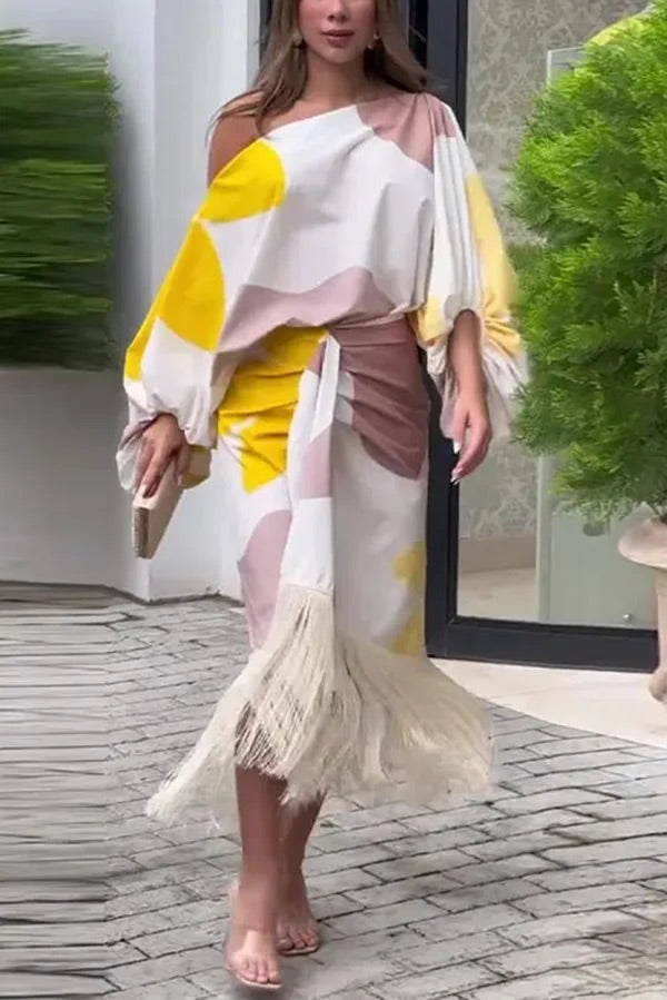Conjunto de top holgado con mangas globo y falda con flecos con estampado único