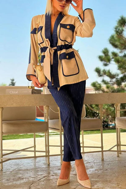 Conjunto de top con bolsillo con solapa y cordón de retazos de Halston y pantalón holgado con cintura elástica a rayas