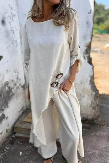Conjunto de pantalones elásticos con bolsillos y botones irregulares, estilo casual y único