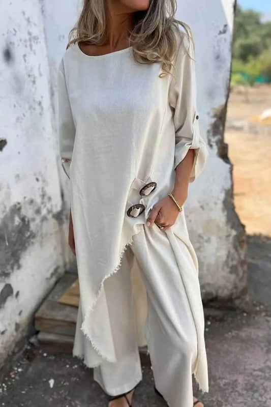 Conjunto de pantalones elásticos con bolsillos y botones irregulares, estilo casual y único