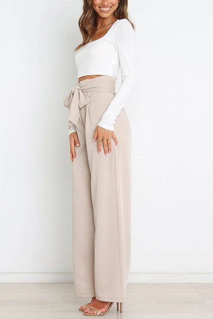 Pantalones anchos con bolsillos y cinturón de moda