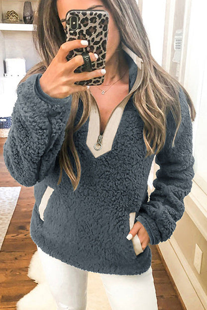 Chaqueta de mujer de manga larga con cuello alto y bolsillo con cremallera