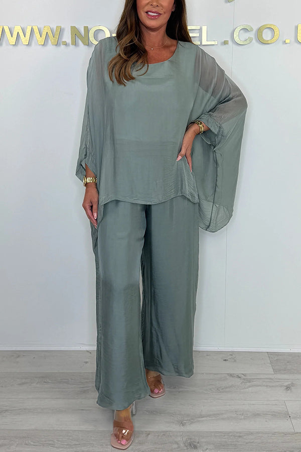 Conjunto de top holgado con cuello redondo y mangas murciélago de color liso y pantalones anchos con cintura elástica