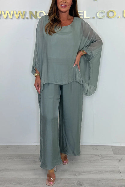 Conjunto de top holgado con cuello redondo y mangas murciélago de color liso y pantalones anchos con cintura elástica
