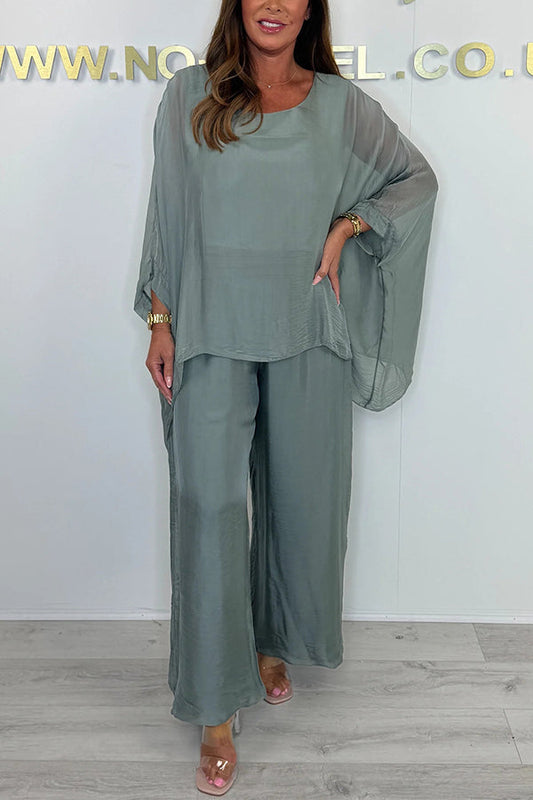 Conjunto de top holgado con cuello redondo y mangas murciélago de color liso y pantalones anchos con cintura elástica