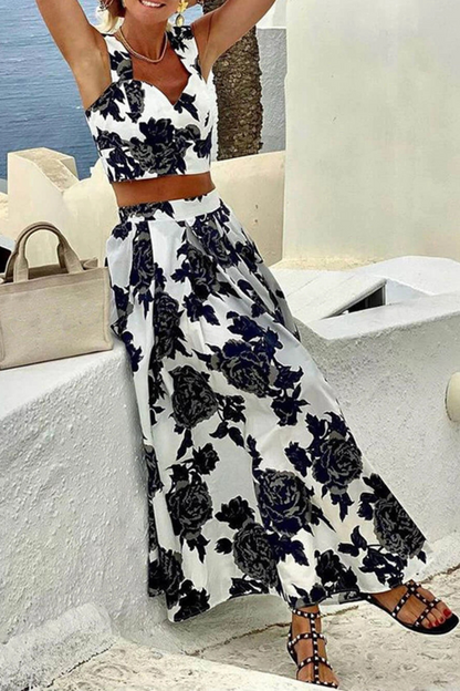 Conjunto de dos piezas de top y falda con tirantes y estampado de moda