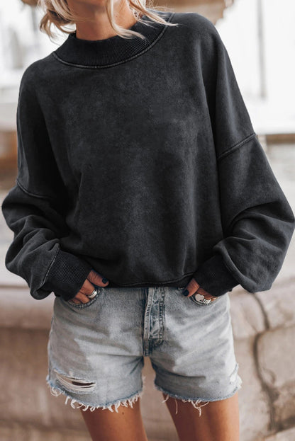 Sudadera lavada con hombros caídos