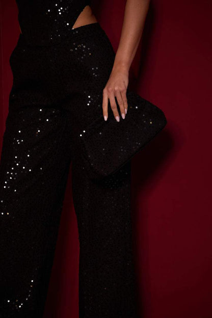 Conjunto de pantalones vaqueros con lentejuelas de Belinda 