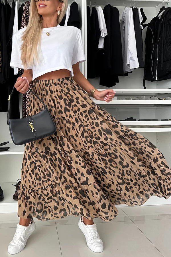 Falda larga en capas con cintura elástica y estampado de leopardo, única y cómoda.