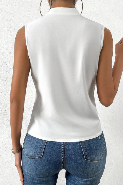 Blusa lisa sin mangas con clase