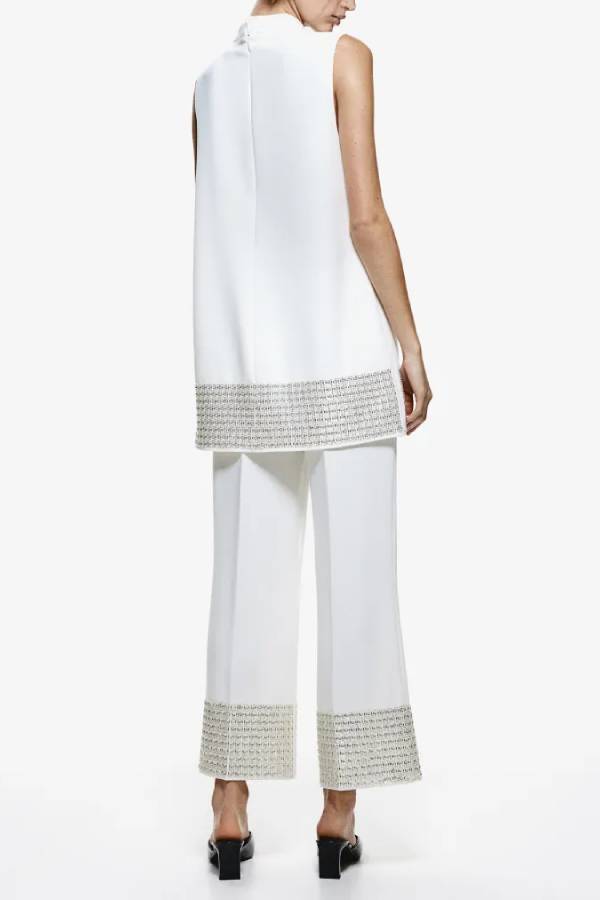Pantalones cortos holgados con cintura elástica y ribete de lentejuelas en la espalda, sencillos pero no sencillos
