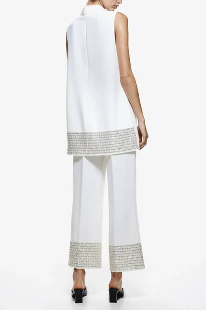 Pantalones cortos holgados con cintura elástica y ribete de lentejuelas en la espalda, sencillos pero no sencillos