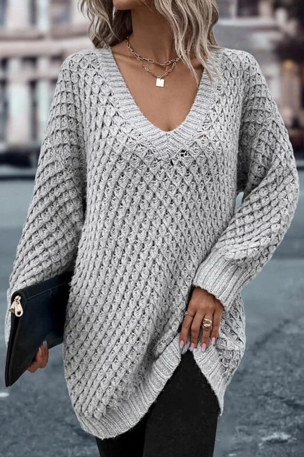 Suéter oversize de algodón con hombros caídos y unicolor