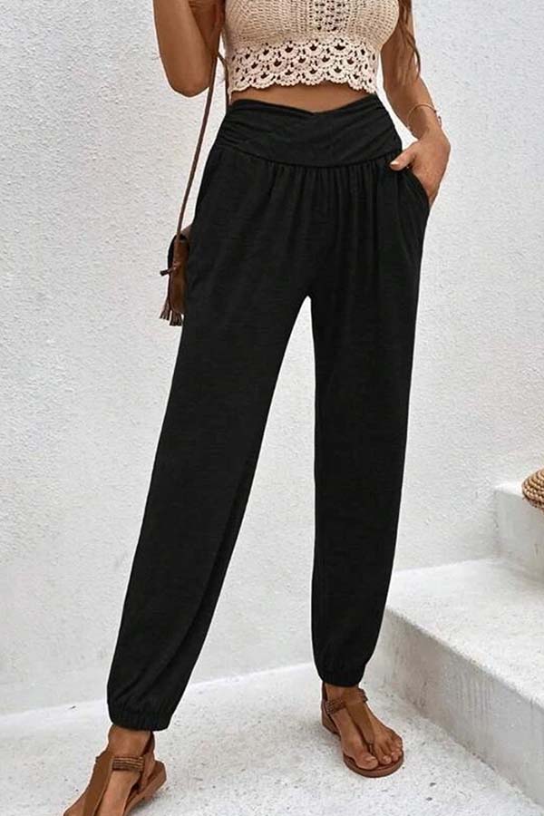 Pantalones casuales de cintura alta con bolsillos sueltos y temperamento