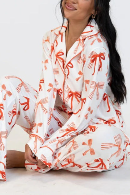 Conjunto de camisa de manga larga con estampado de lazo navideño y pantalón con bolsillo en la cintura elástica