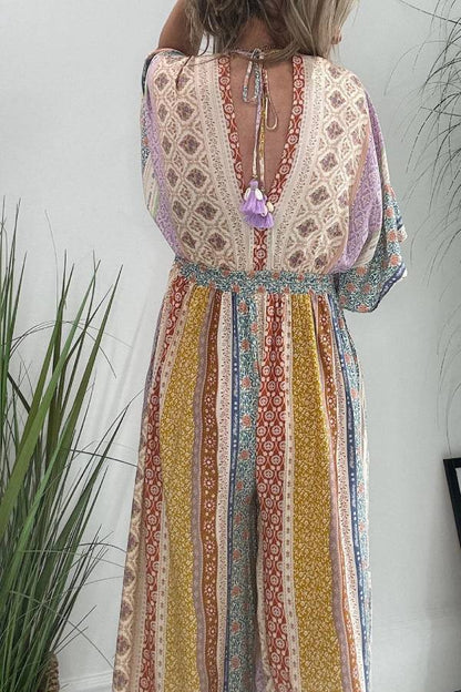 Mono holgado de pierna ancha con bolsillos y mangas acampanadas con estampado floral retro de Last Queen