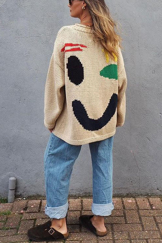 Suéter holgado con cara sonriente de colores que te hace sentir bien 
