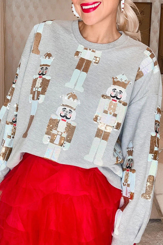 Sudadera holgada con estampado de Cascanueces colorido y tradiciones navideñas