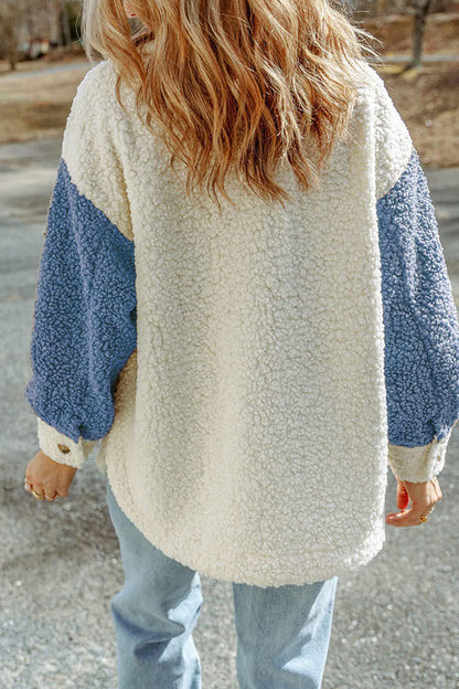 Abrigo de piel holgado con bloques de color y doble bolsillo de manga larga para otoño e invierno