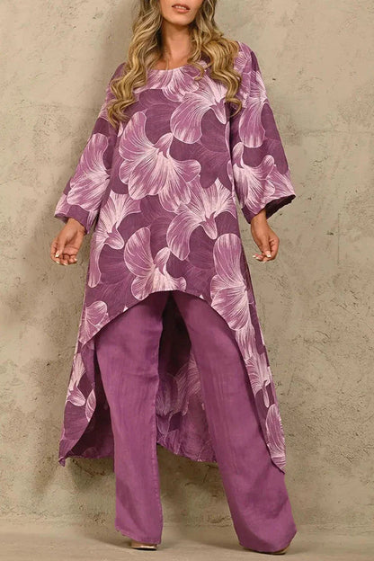 Exquisito traje de pantalón con cuello redondo y paneles con estampado floral