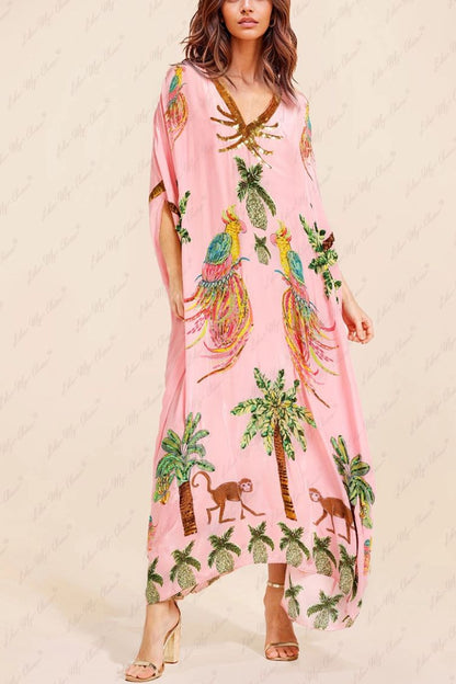 Vestido único con estampado de cocoteros y mangas caídas en los hombros