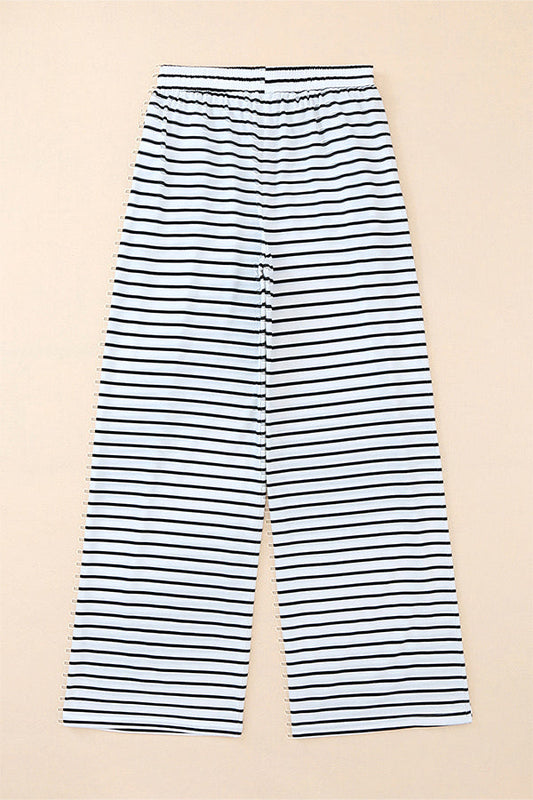 Pantalones casuales de rayas con cordón y pierna ancha con bolsillos