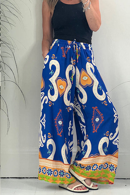 Pantalones con cintura elástica y cordón ajustable con bolsillos y estampado de Reina de Corazones
