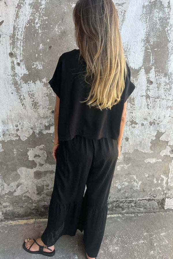 Conjunto de top casual de manga corta con cuello redondo y cintura elástica con bolsillo para atar y pantalones anchos de color liso