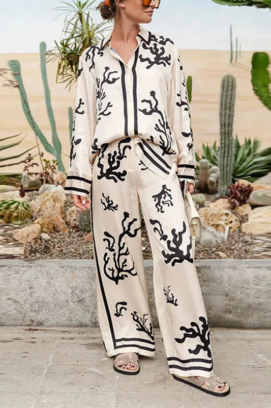PANTALONES DE SATÉN LIGEROS Y CÓMODOS CON ESTAMPADO ÚNICO, CINTURA ELÁSTICA Y BOLSILLOS DE PIERNA ANCHA