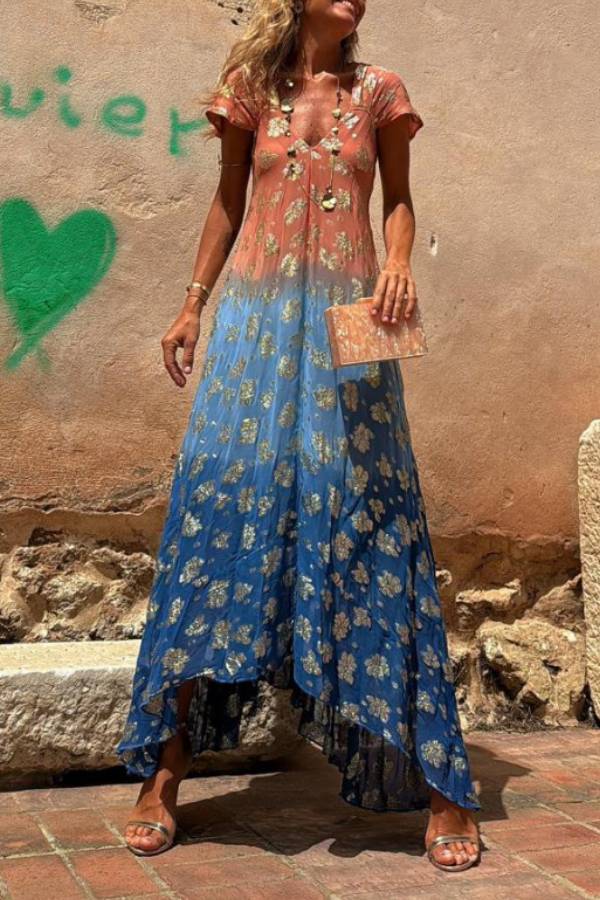 Vestido largo Evaluna con estampado de flores doradas en degradado tie-dye y manga corta