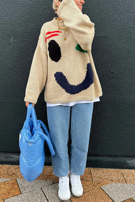 Suéter holgado con cara sonriente de colores que te hace sentir bien 