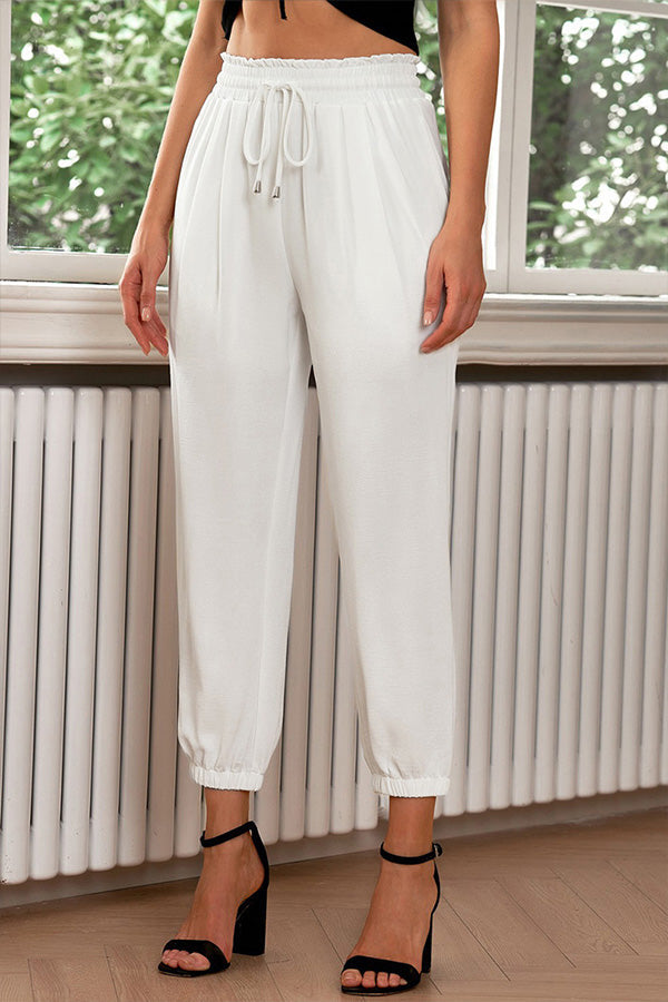 Pantalones de cintura alta con cordones y puños de tubo