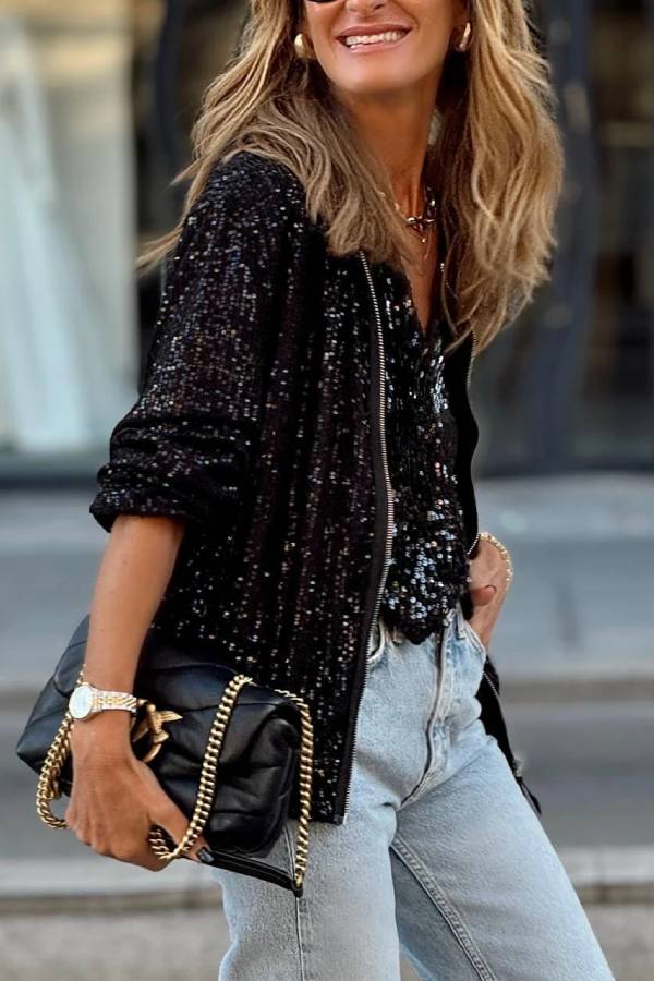 Chaqueta negra con cremallera y lentejuelas 
