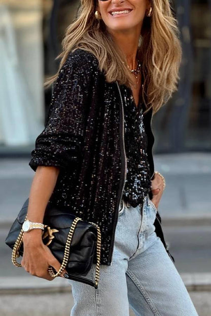 Chaqueta negra con cremallera y lentejuelas 