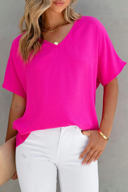 Blusa de manga corta con cuello en V y color liso