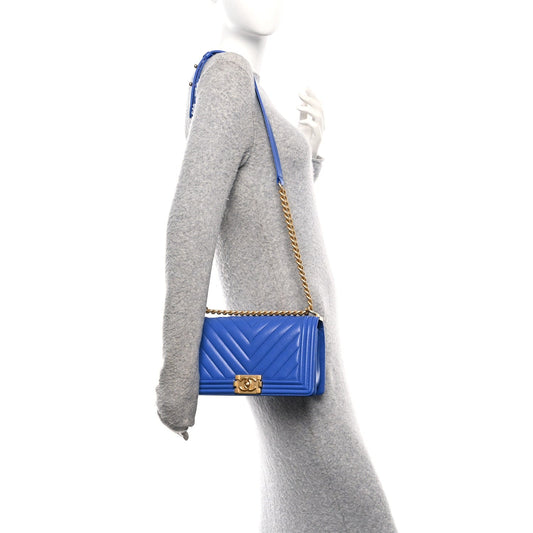 Caviar Chevron Quilted Medium Boy Flap Dark Blue